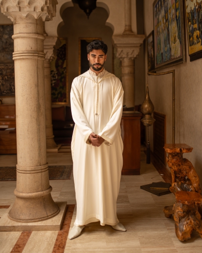Mlifa djellaba with a chiffon chemise featuring a striped collar.